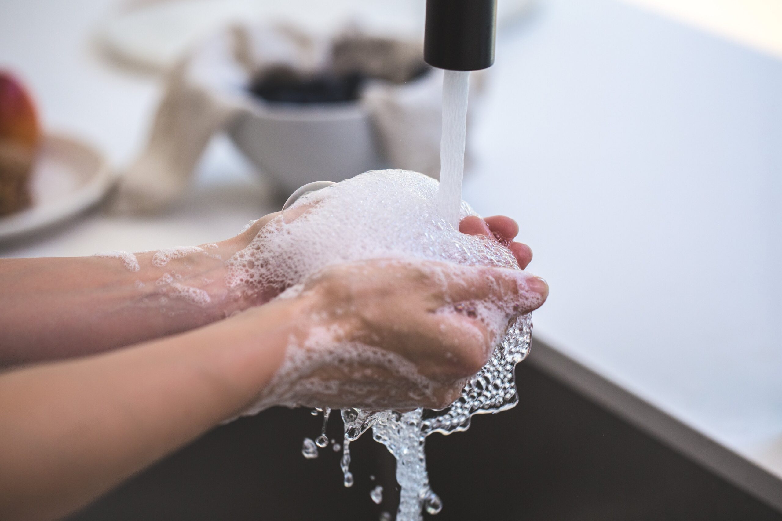 person washing his hand 545014 1 scaled
